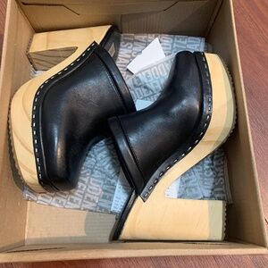 Steve Madden clog type shoes, black with wooden heel.